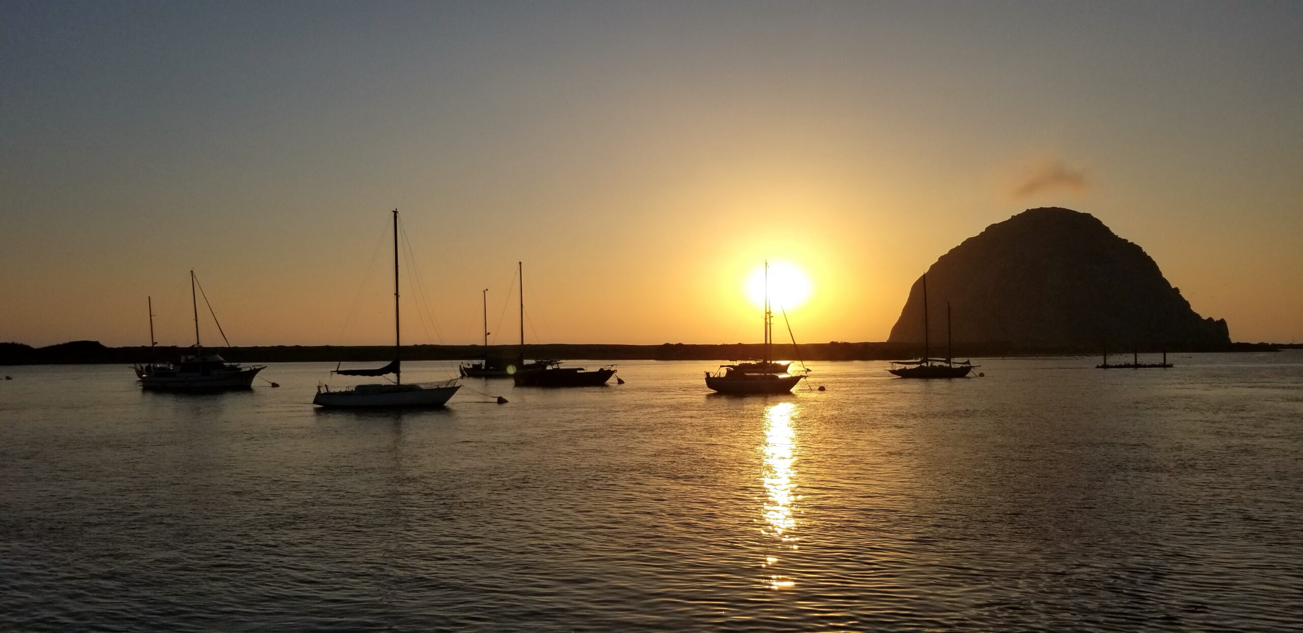 Sail boats at sunset 